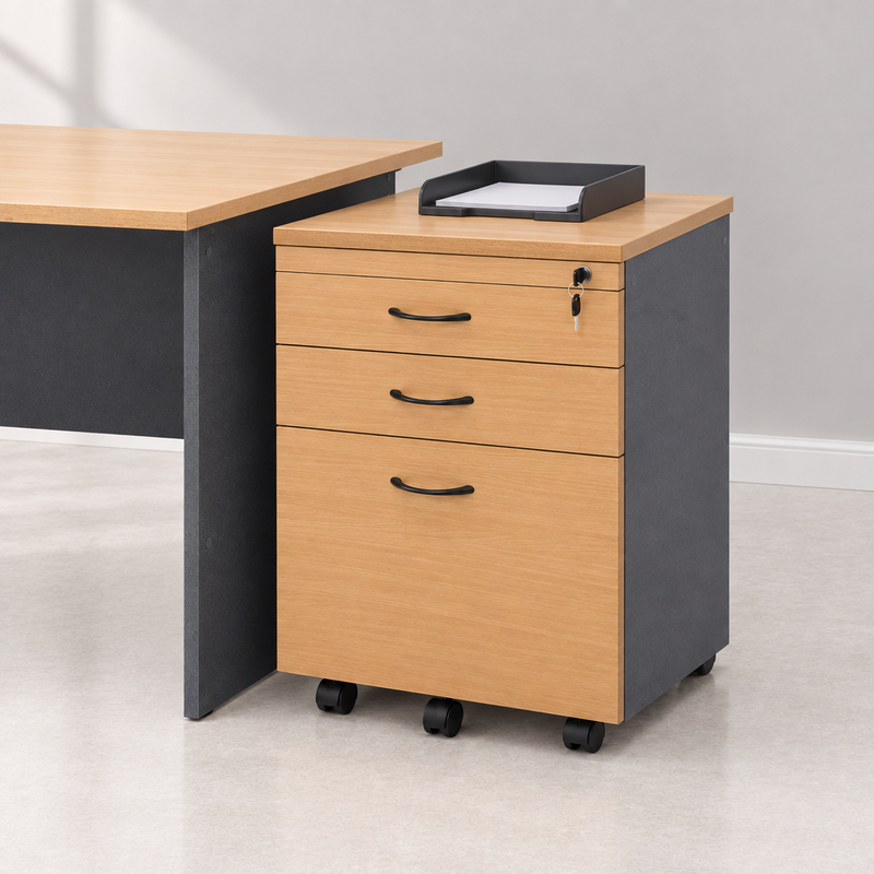 Mobile pedestal beside a desk with closed drawers and an in-tray on top